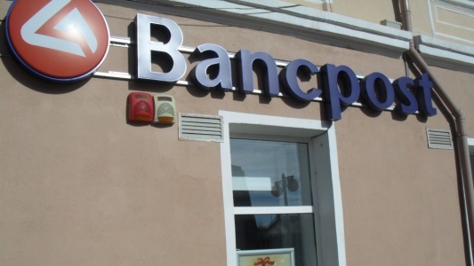 Bancpost reduce cu 30% rata pentru clientii cu credite in franci elvetieni